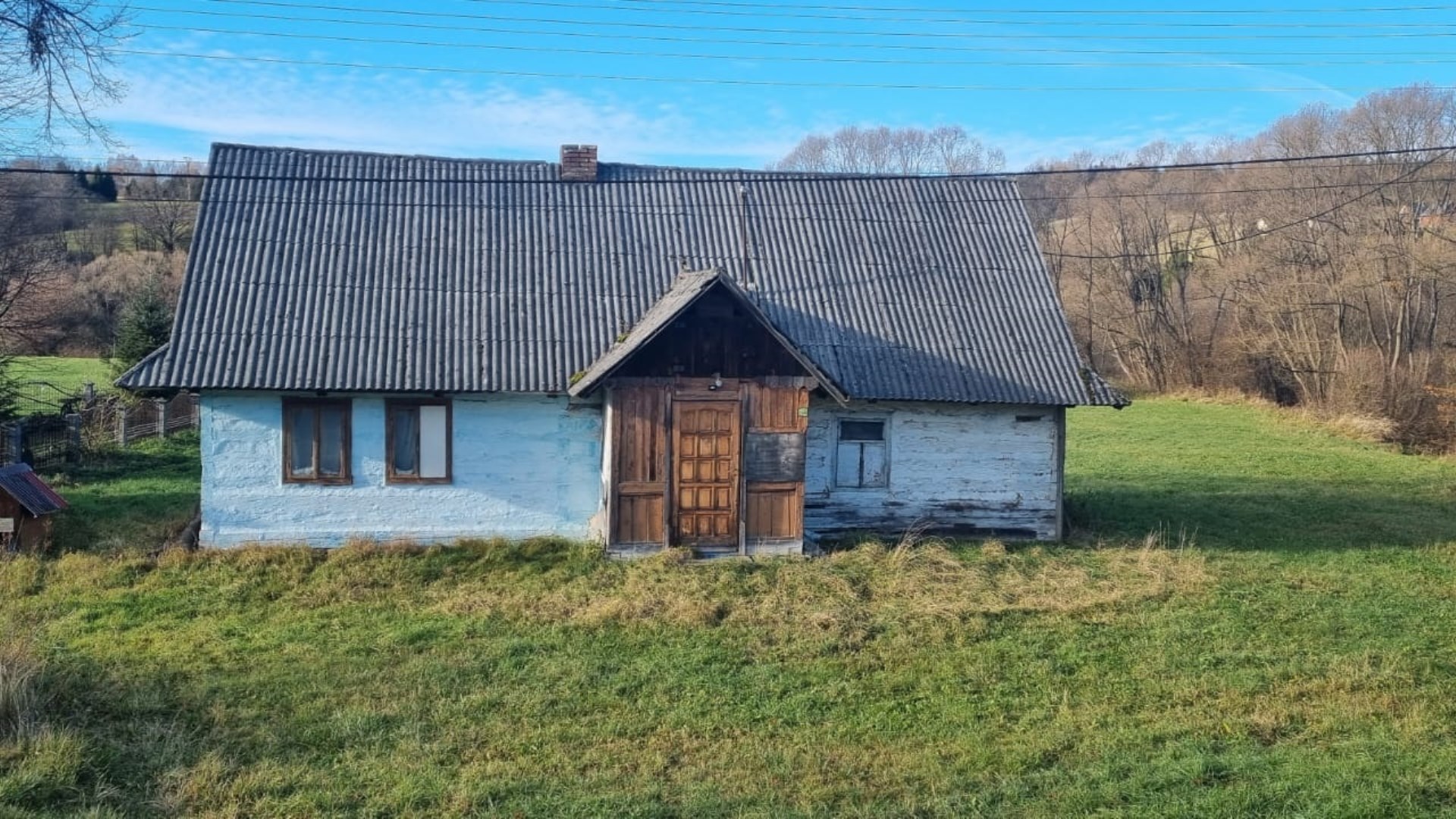 Dom drewniany na działce o powierzchni 34a