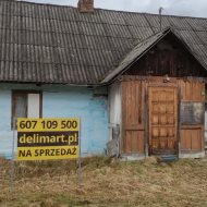 Dom drewniany na działce o powierzchni 34a