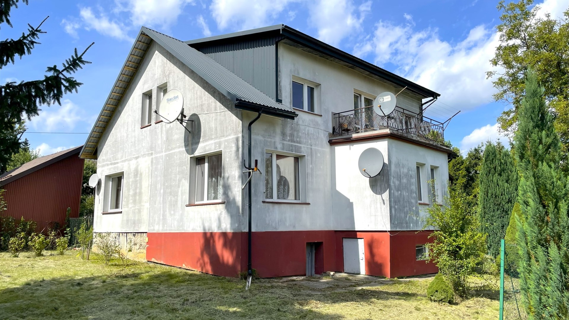 Sanok - lokal mieszkalny i druga działka 5ar. 