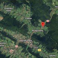 Dom drewniany na działce o powierzchni 34a